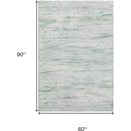 Artichoke Green And Ivory Abstract Washable Area Rug With UV Protection Photo 9