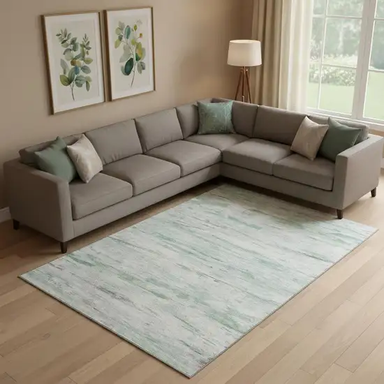 Artichoke Green And Ivory Abstract Washable Area Rug With UV Protection Photo 2