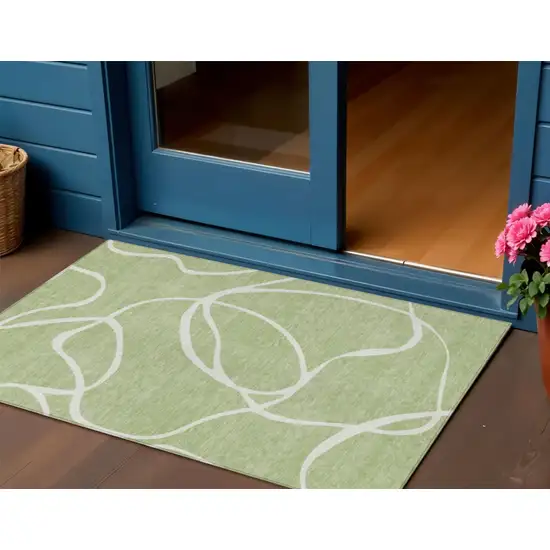 Artichoke Green And Ivory Abstract Washable Indoor Outdoor Area Rug Photo 1