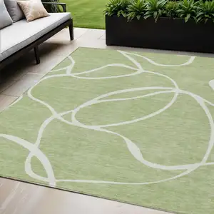 Photo of Artichoke Green And Ivory Abstract Washable Indoor Outdoor Area Rug