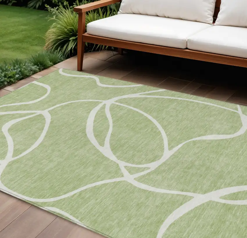Artichoke Green And Ivory Abstract Washable Indoor Outdoor Area Rug Photo 1