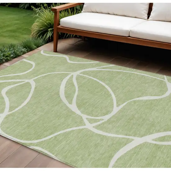 Artichoke Green And Ivory Abstract Washable Indoor Outdoor Area Rug Photo 1