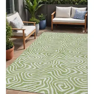 Photo of Artichoke Green And Ivory Abstract Washable Indoor Outdoor Area Rug