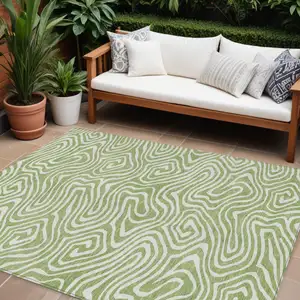 Photo of Artichoke Green And Ivory Abstract Washable Indoor Outdoor Area Rug