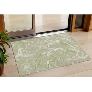 Photo of Artichoke Green And Ivory Abstract Washable Indoor Outdoor Area Rug