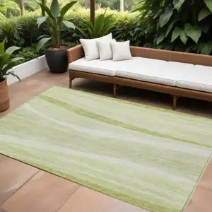 Photo of Artichoke Green And Ivory Abstract Washable Indoor Outdoor Area Rug