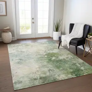 Photo of Artichoke Green And Ivory Abstract Washable Indoor Outdoor Area Rug