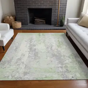Photo of Artichoke Green And Ivory Abstract Washable Indoor Outdoor Area Rug