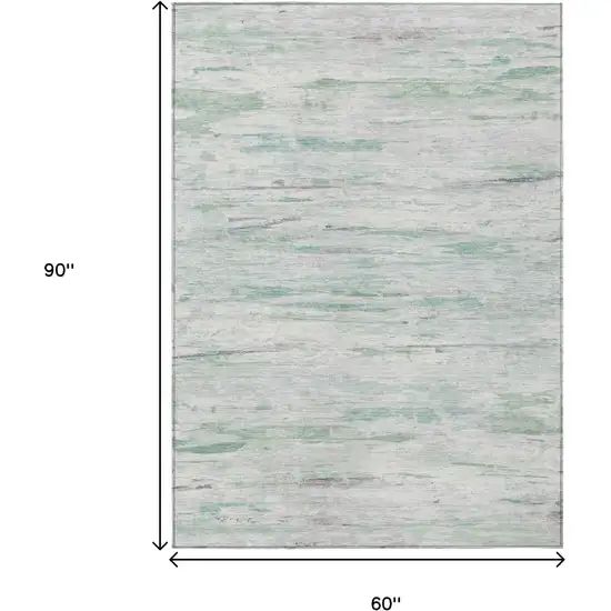 Artichoke Green And Ivory Abstract Washable Indoor Outdoor Area Rug Photo 9