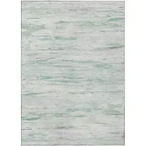 Photo of Artichoke Green And Ivory Abstract Washable Indoor Outdoor Area Rug