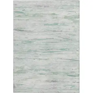 Photo of Artichoke Green And Ivory Abstract Washable Indoor Outdoor Area Rug