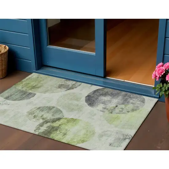 Artichoke Green And Ivory Abstract Washable Indoor Outdoor Area Rug Photo 1