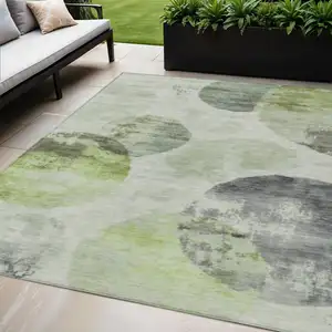 Photo of Artichoke Green And Ivory Abstract Washable Indoor Outdoor Area Rug