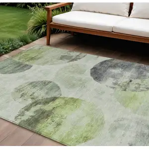 Photo of Artichoke Green And Ivory Abstract Washable Indoor Outdoor Area Rug