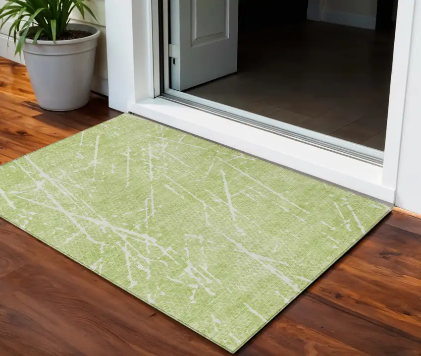 Artichoke Green And Ivory Abstract Washable Indoor Outdoor Area Rug Photo 1