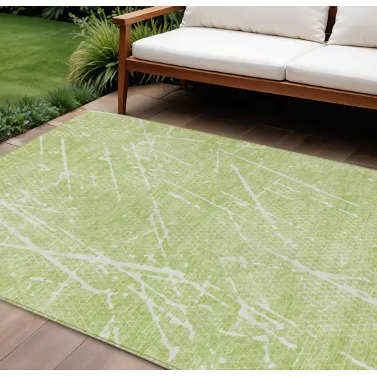 Artichoke Green And Ivory Abstract Washable Indoor Outdoor Area Rug Photo 1