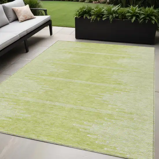 Artichoke Green And Ivory Abstract Washable Indoor Outdoor Area Rug Photo 1