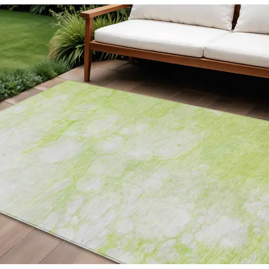 Artichoke Green And Ivory Abstract Washable Indoor Outdoor Area Rug Photo 1