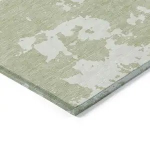 Photo of Artichoke Green And Ivory Abstract Washable Indoor Outdoor Area Rug