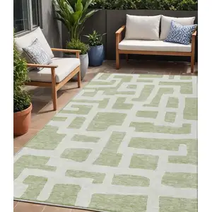 Photo of Artichoke Green And Ivory Abstract Washable Indoor Outdoor Area Rug