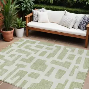 Photo of Artichoke Green And Ivory Abstract Washable Indoor Outdoor Area Rug