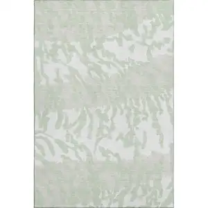 Photo of Artichoke Green And Ivory Animal Print Washable Area Rug With UV Protection
