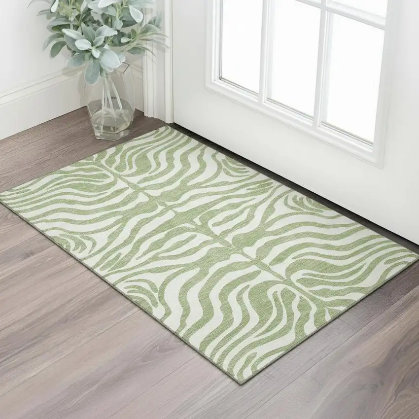 Artichoke Green And Ivory Animal Print Washable Area Rug With UV Protection Photo 2