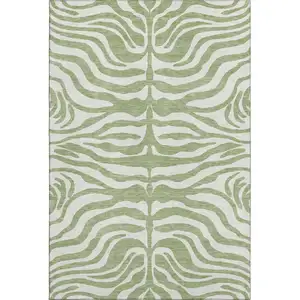 Photo of Artichoke Green And Ivory Animal Print Washable Area Rug With UV Protection