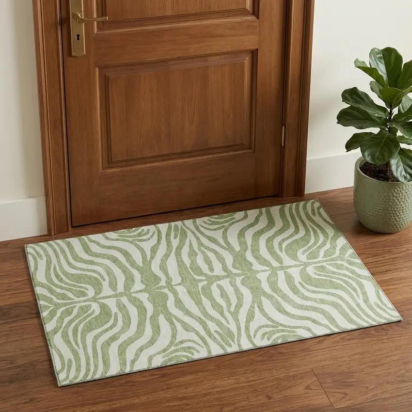 Artichoke Green And Ivory Animal Print Washable Area Rug With UV Protection Photo 1