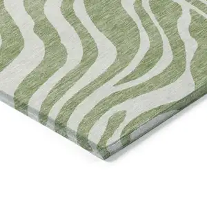 Photo of Artichoke Green And Ivory Animal Print Washable Indoor Outdoor Area Rug