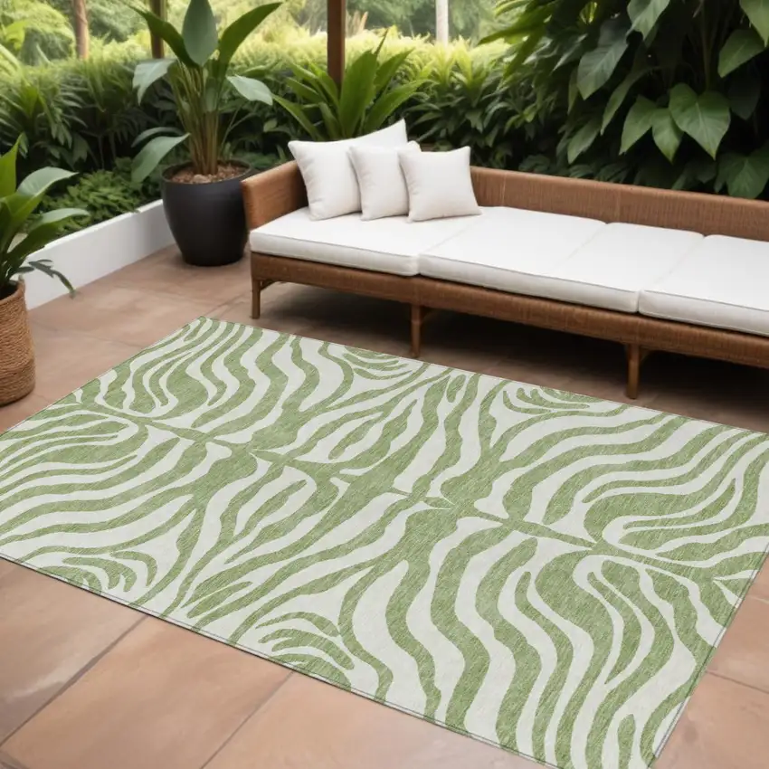 Artichoke Green And Ivory Animal Print Washable Indoor Outdoor Area Rug Photo 1