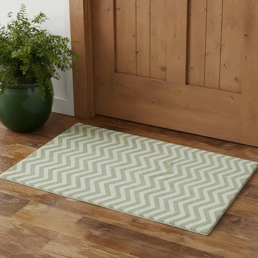 Artichoke Green And Ivory Chevron Washable Area Rug With UV Protection Photo 1