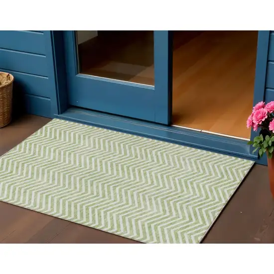 Artichoke Green And Ivory Chevron Washable Indoor Outdoor Area Rug Photo 1