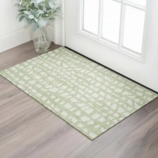 Artichoke Green And Ivory Cobblestone Washable Area Rug With UV Protection Photo 1