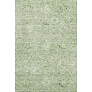 Photo of Artichoke Green And Ivory Damask Washable Area Rug With UV Protection