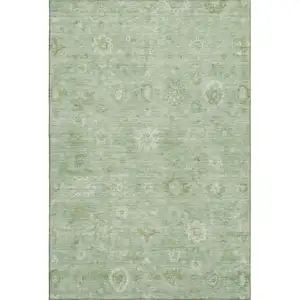 Photo of Artichoke Green And Ivory Damask Washable Area Rug With UV Protection