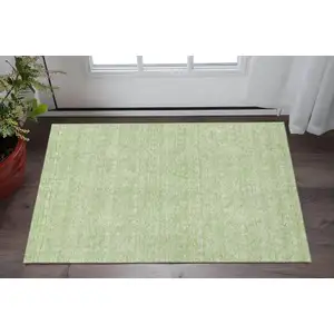 Photo of Artichoke Green And Ivory Floral Washable Area Rug With UV Protection