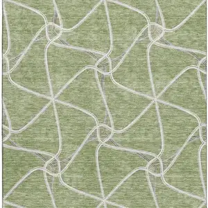 Photo of Artichoke Green And Ivory Geometric Washable Area Rug With UV Protection