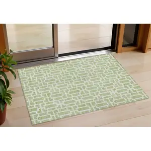 Photo of Artichoke Green And Ivory Geometric Washable Indoor Outdoor Area Rug