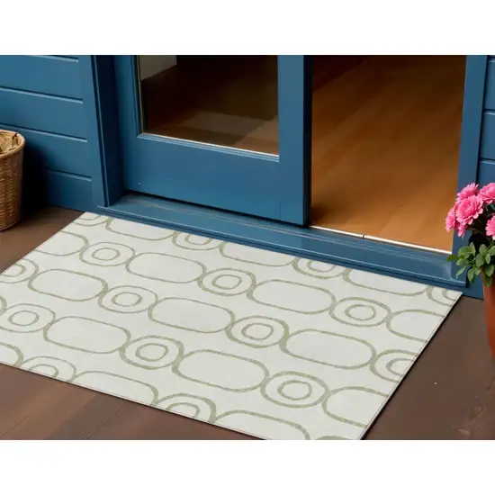 Artichoke Green And Ivory Geometric Washable Indoor Outdoor Area Rug Photo 1