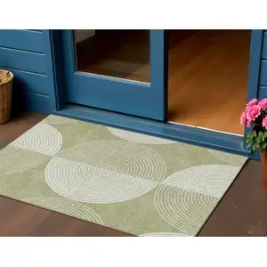 Photo of Artichoke Green And Ivory Geometric Washable Indoor Outdoor Area Rug