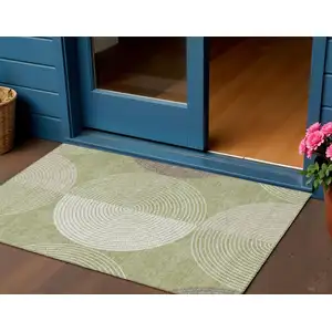 Photo of Artichoke Green And Ivory Geometric Washable Indoor Outdoor Area Rug