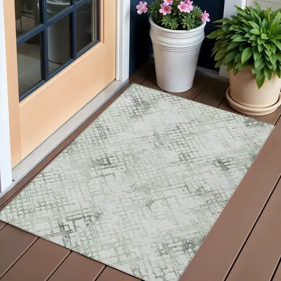 Artichoke Green And Ivory Geometric Washable Indoor Outdoor Area Rug Photo 1