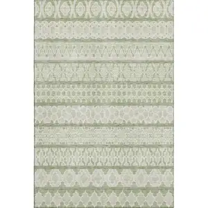 Photo of Artichoke Green And Ivory Ikat Washable Area Rug With UV Protection
