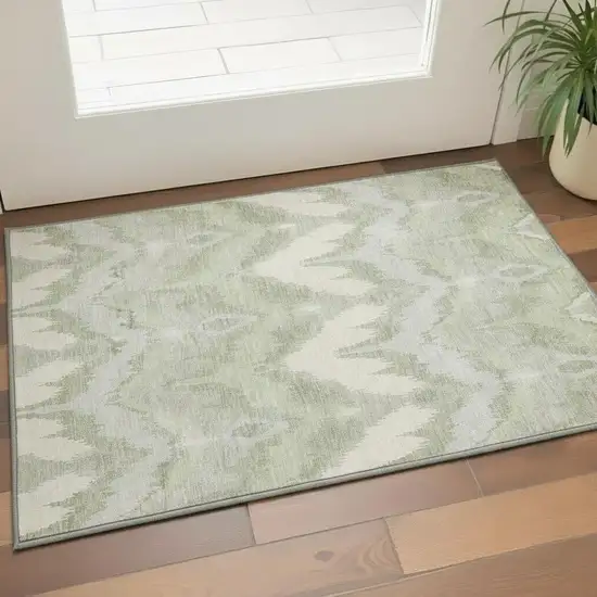 Artichoke Green And Ivory Ikat Washable Area Rug With UV Protection Photo 2