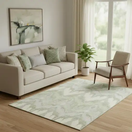 Artichoke Green And Ivory Ikat Washable Area Rug With UV Protection Photo 1