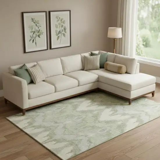 Artichoke Green And Ivory Ikat Washable Area Rug With UV Protection Photo 1