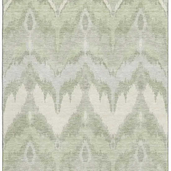 Artichoke Green And Ivory Ikat Washable Area Rug With UV Protection Photo 4