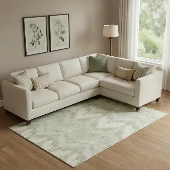 Artichoke Green And Ivory Ikat Washable Area Rug With UV Protection Photo 1