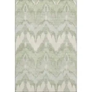Photo of Artichoke Green And Ivory Ikat Washable Area Rug With UV Protection